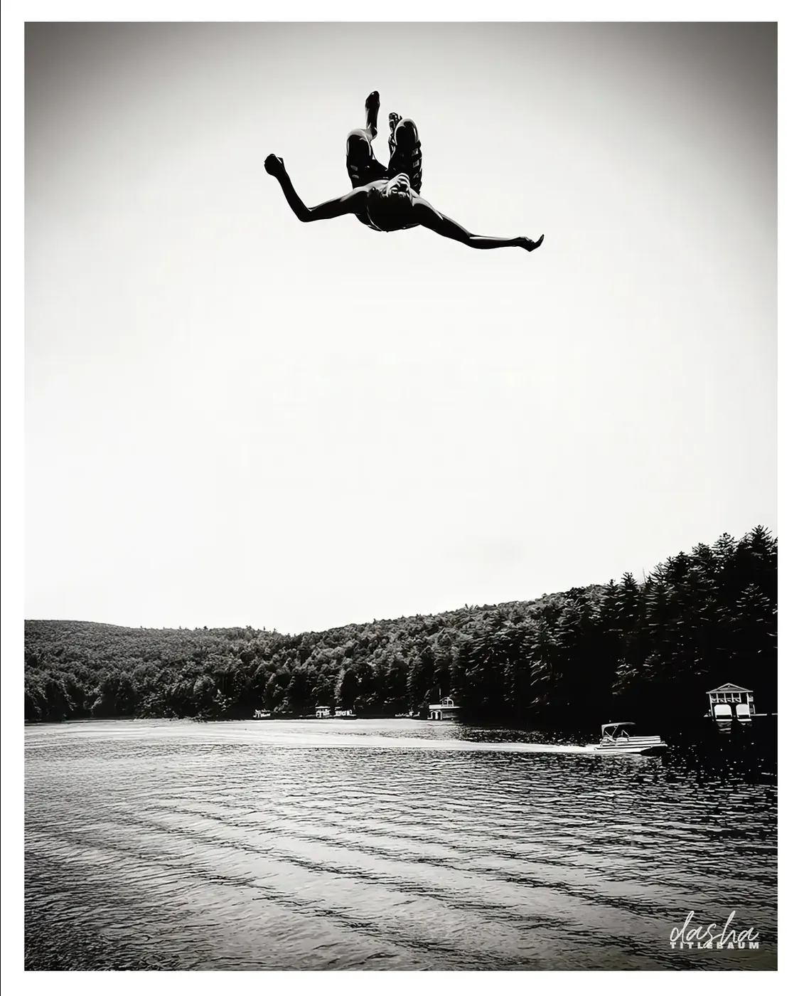 Freedom at the Lake, Black and white editorial frame capturing pure joy and human expression.